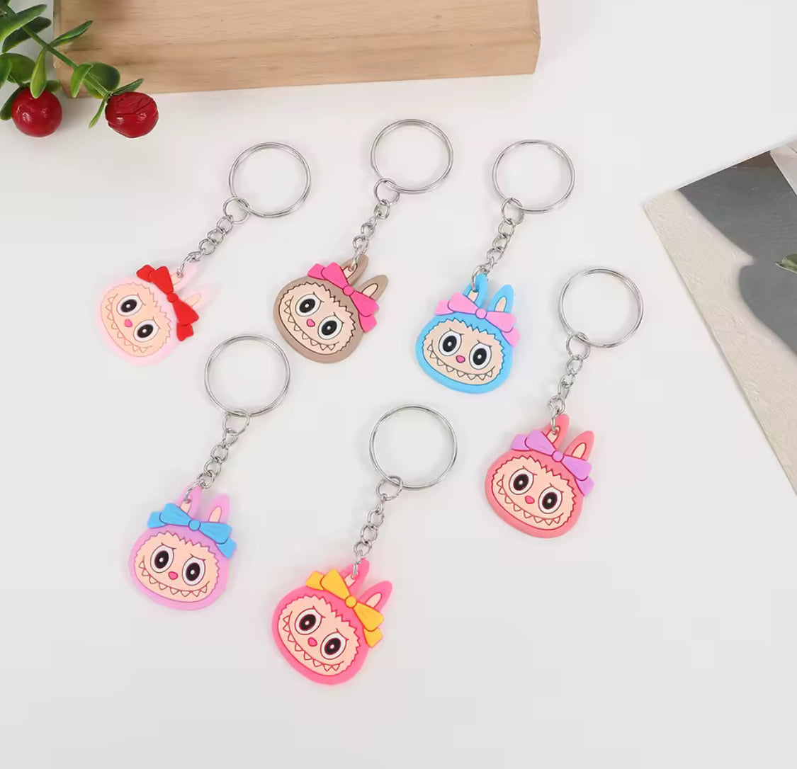 Little monsters with bow key chain