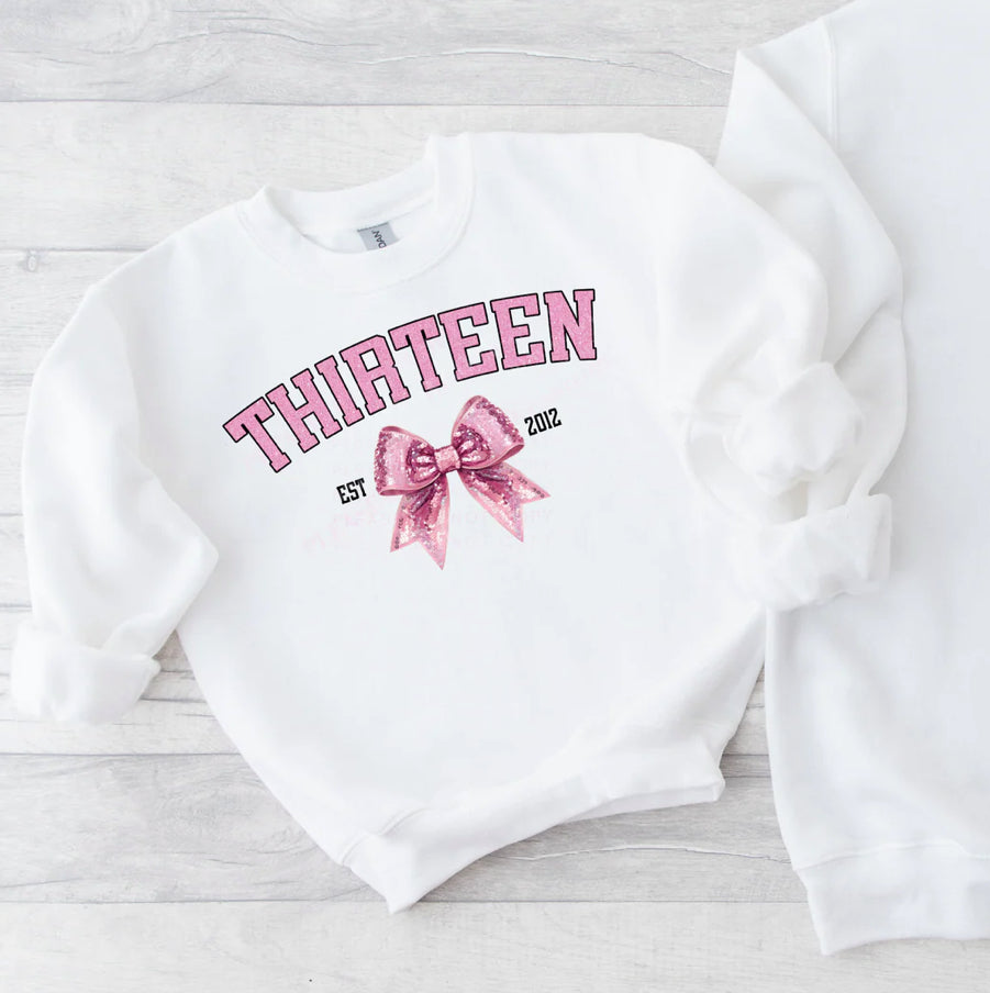 GLITTER BIRTHDAY BOW NUMBER & BIRTH YEAR SWEATSHIRT