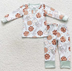 Milk and cookies bow Christmas pyjamas and romper suits