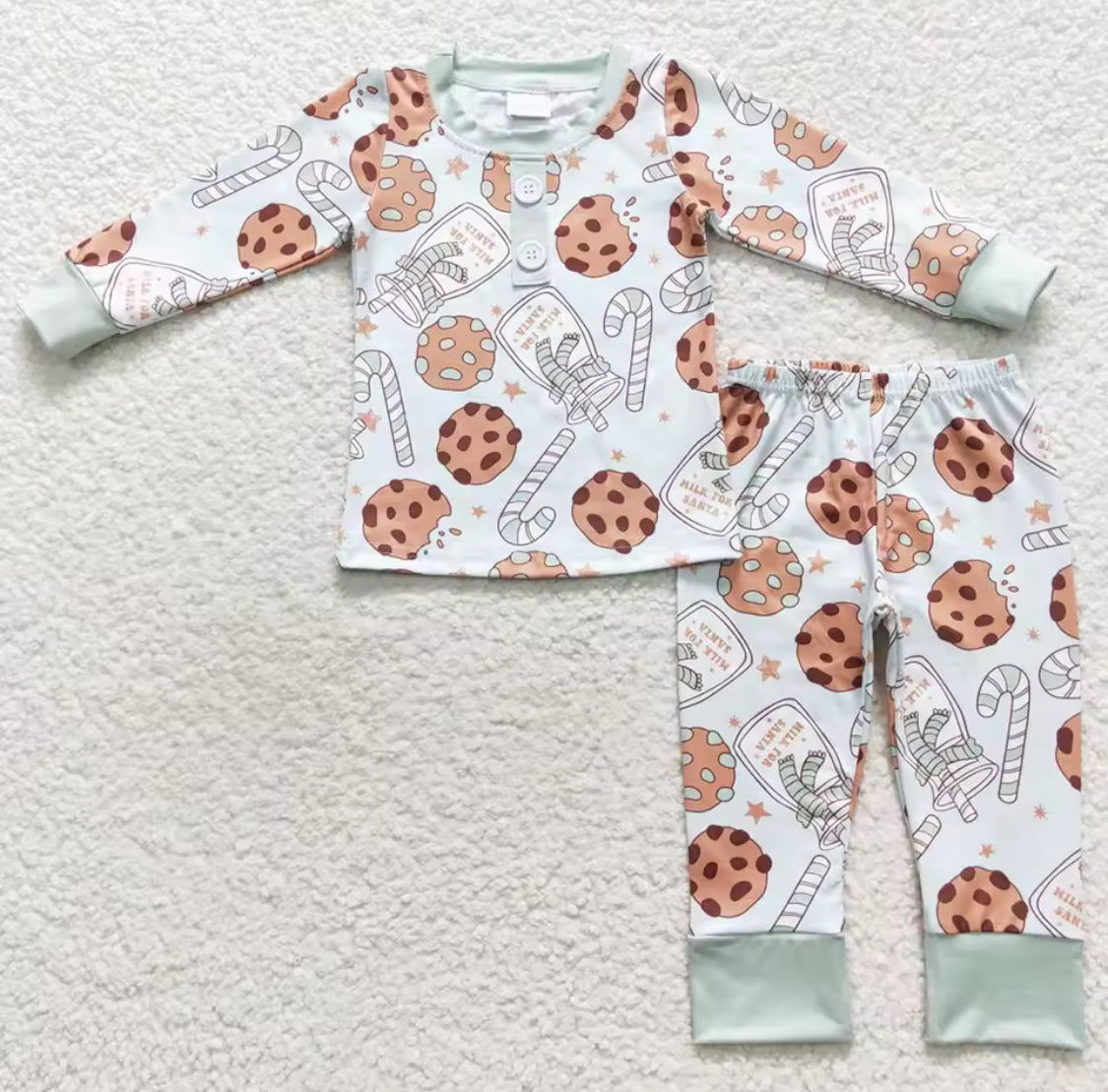 Milk and cookies bow Christmas pyjamas and romper suits