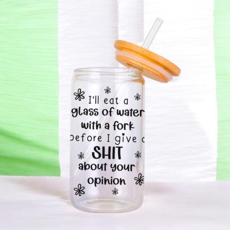 Glass of water with a fork glass Libby can